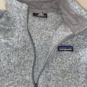 Woman’s grey Patagonia pullover